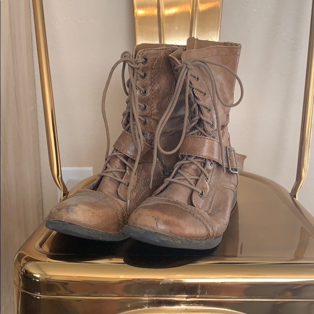 Brown leather boots in vintage condition
